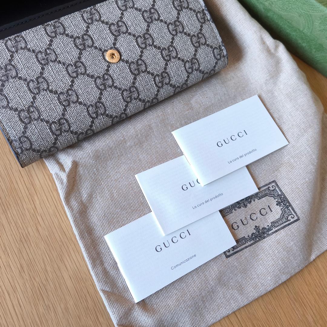 新品未使用！Gucci 人気 GGスプリーム ユニセックス 二つ折り長財布