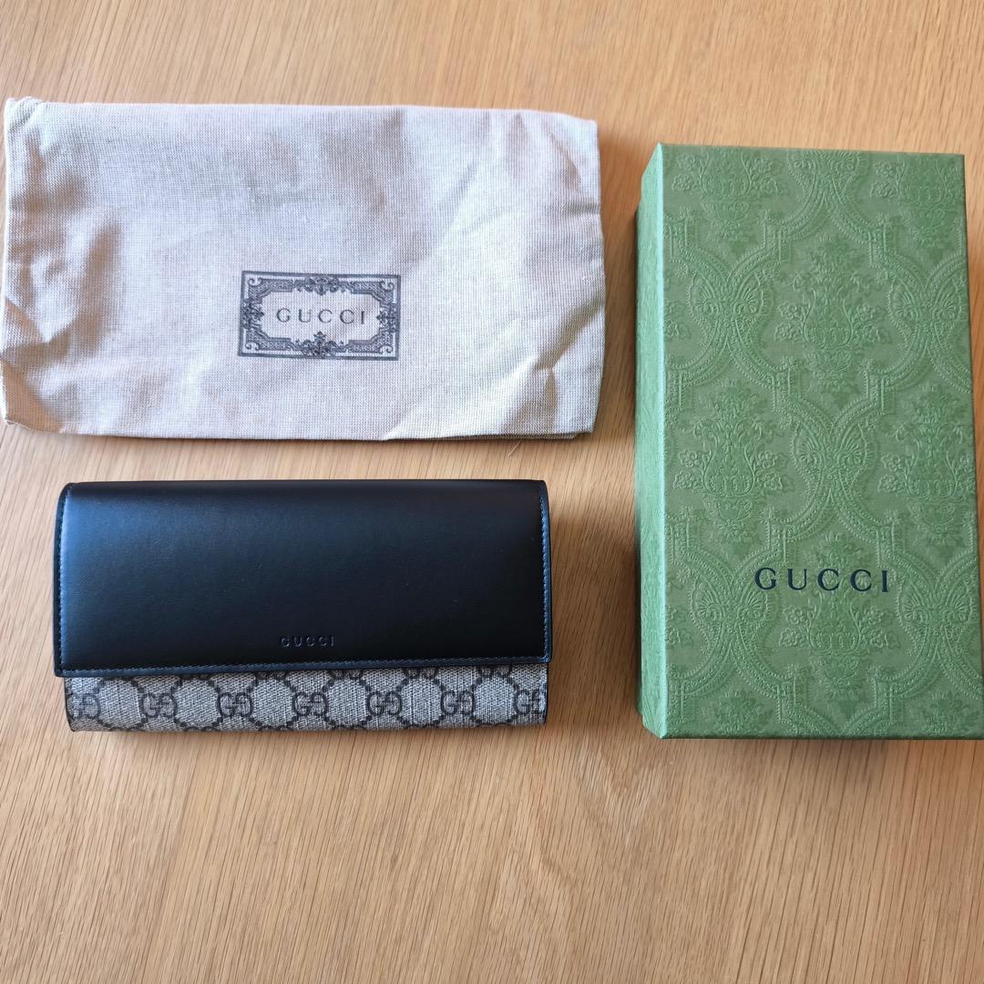 新品未使用！Gucci 人気 GGスプリーム ユニセックス 二つ折り長財布