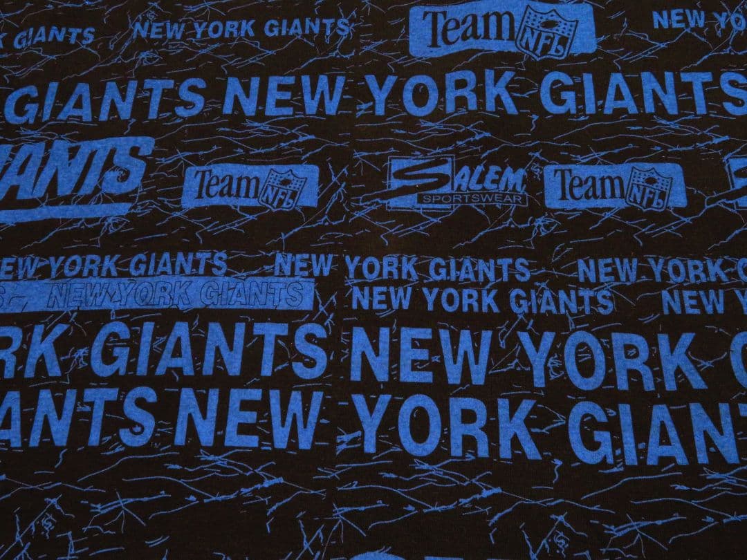 ✅️ USA製 ビンテージ NFL ジャイアンツ Tシャツ 総柄 アメフト L