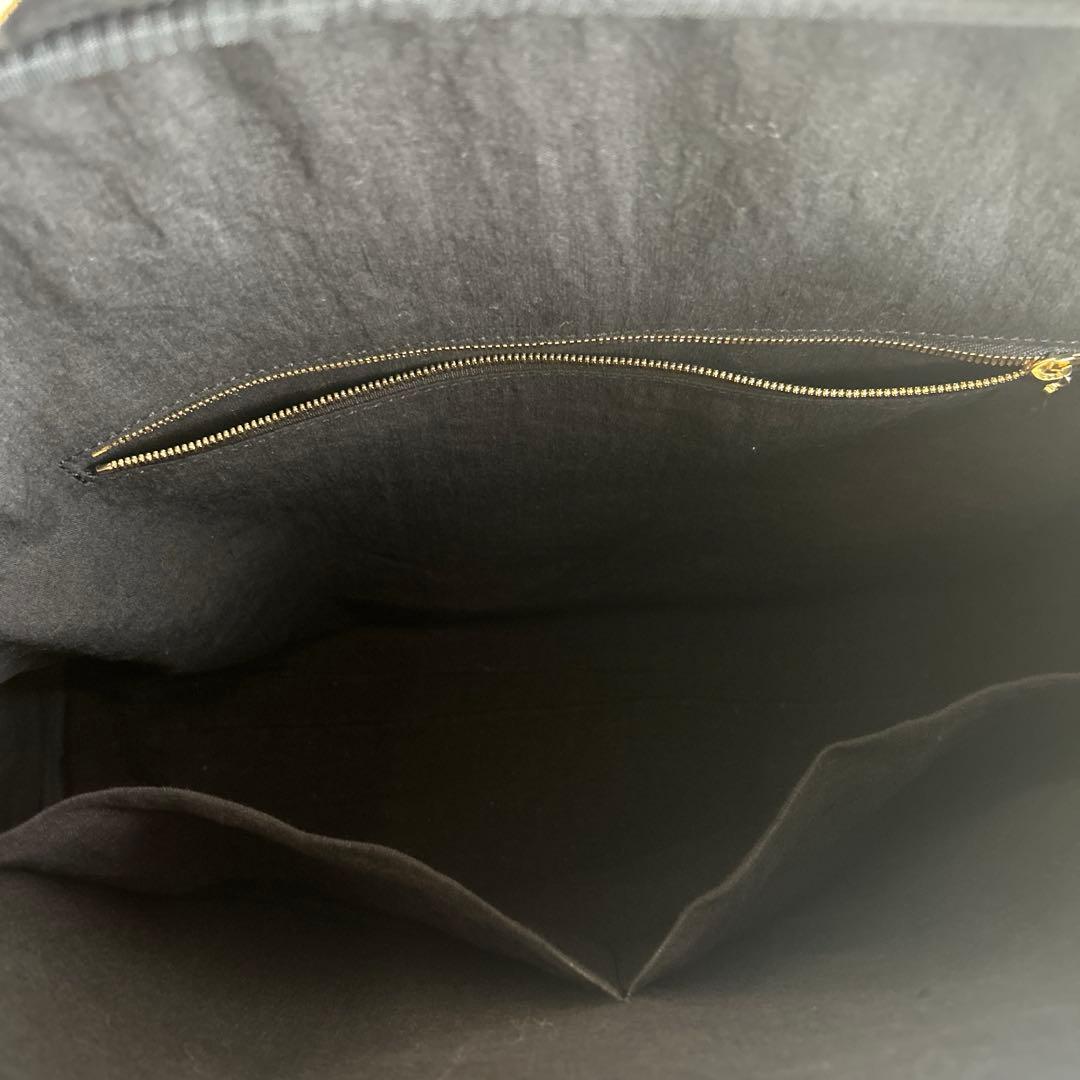 evam eva トラベルバッグ ブラック