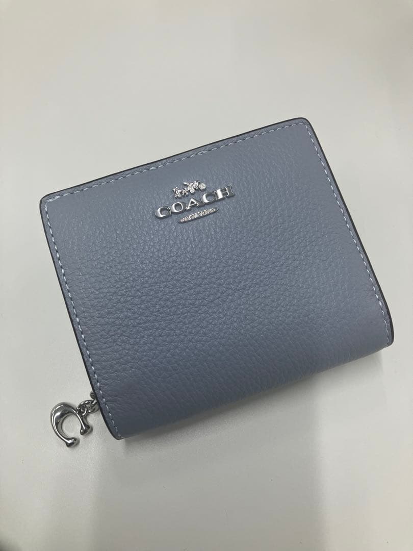 coach 二つ折り財布(空色)未使用品　袋付き