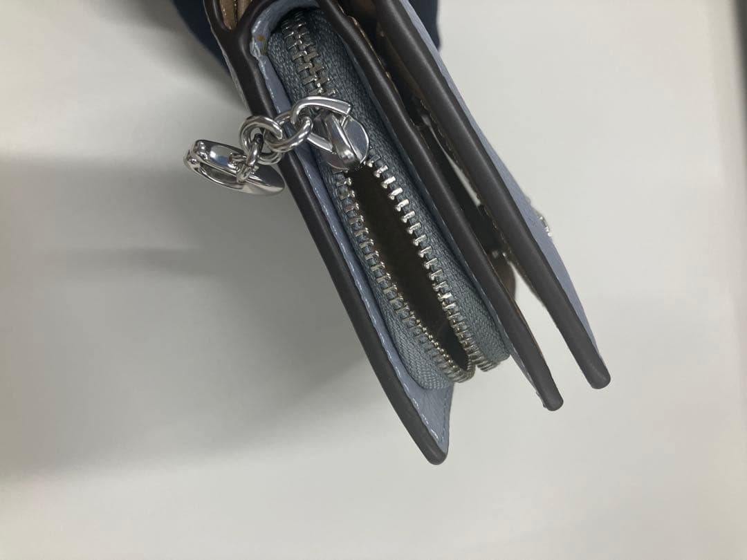 coach 二つ折り財布(空色)未使用品　袋付き