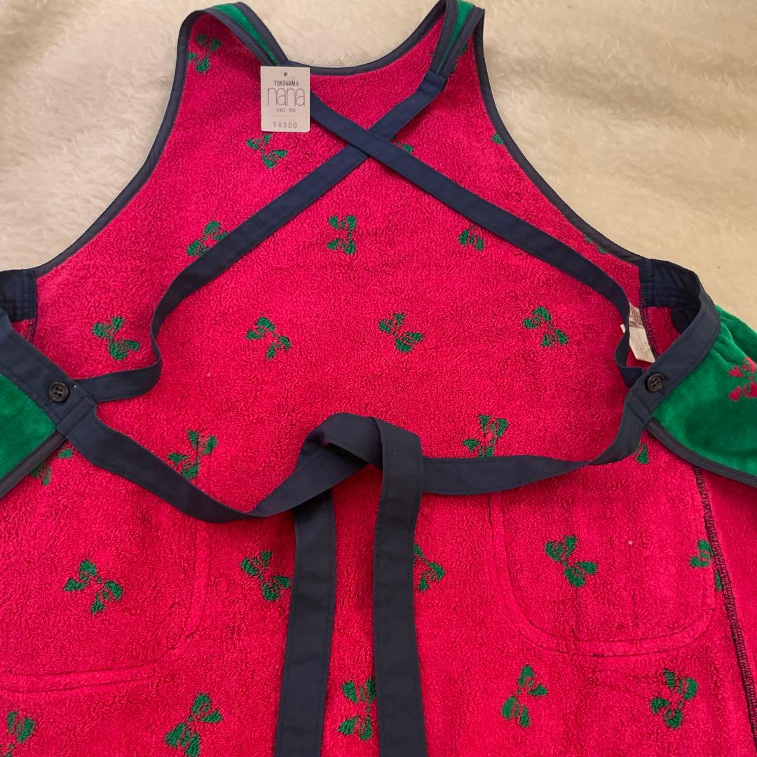 横浜nana タオル地エプロン 新品未使用　グリーンx赤　リボン柄