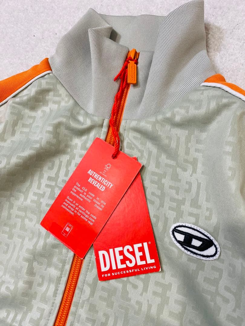 8437. 【未使用タグ付き】DIESEL 総柄トラックジャケット