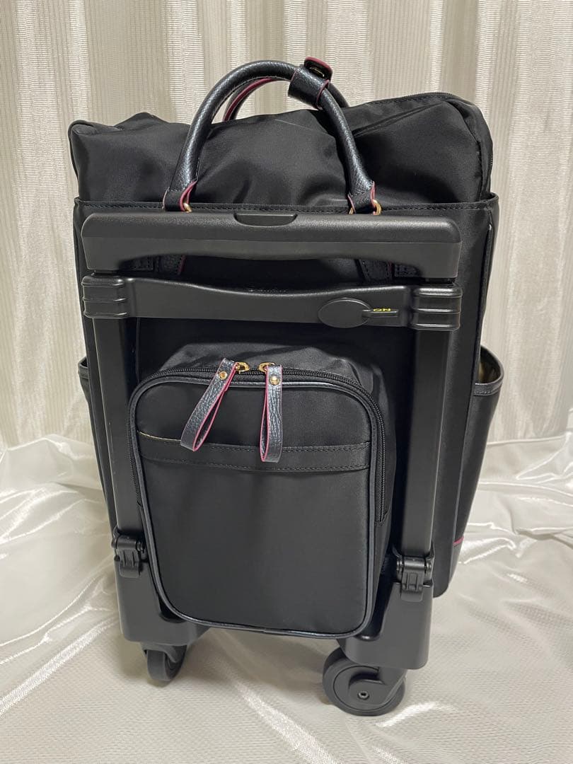 美品　SWANY(スワニー)リリーア キャリー　四輪ストッパー　レインカバー付き