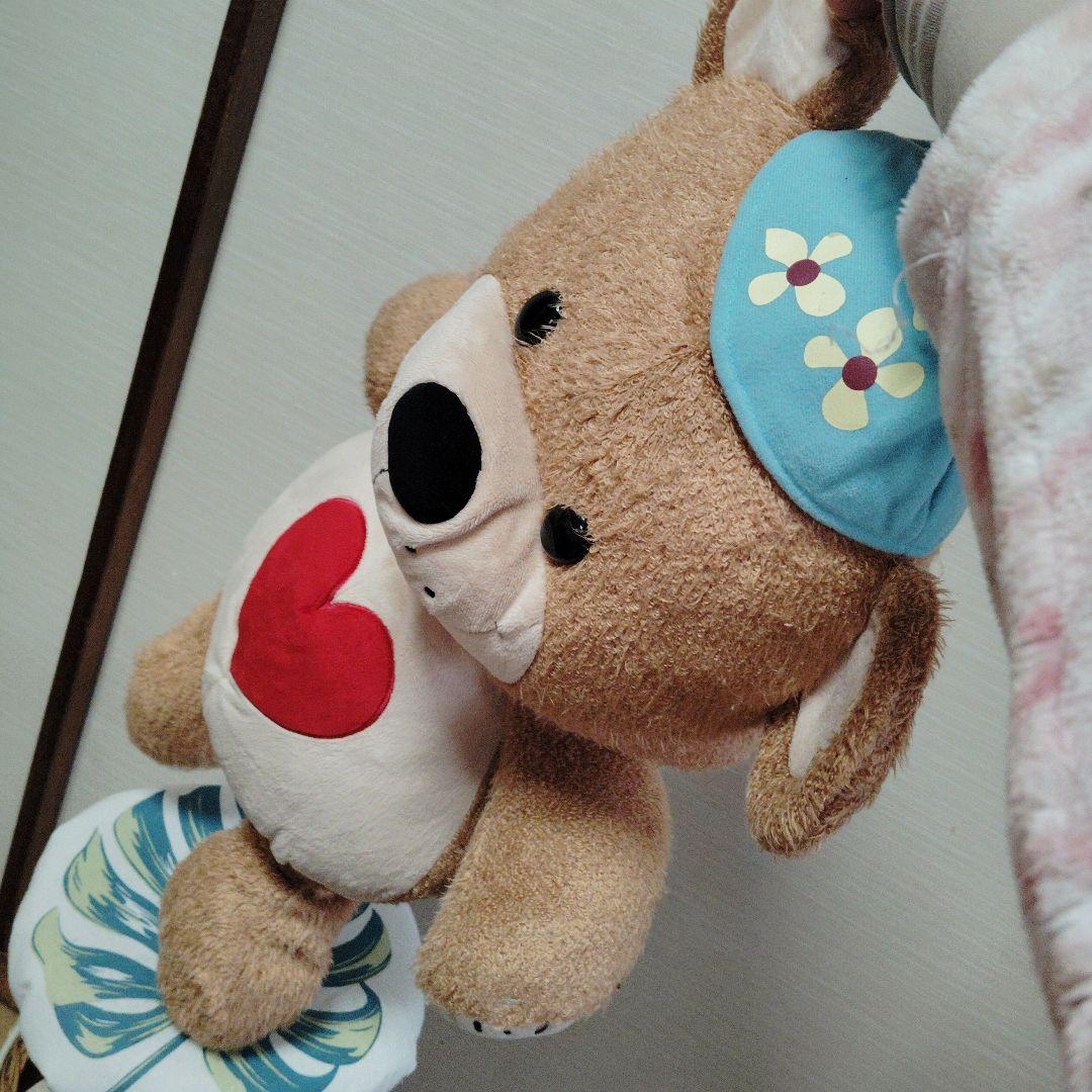 茶色いクマのぬいぐるみ 青い帽子付き