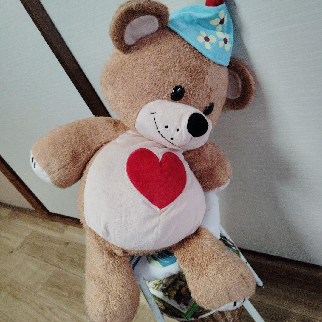 茶色いクマのぬいぐるみ 青い帽子付き