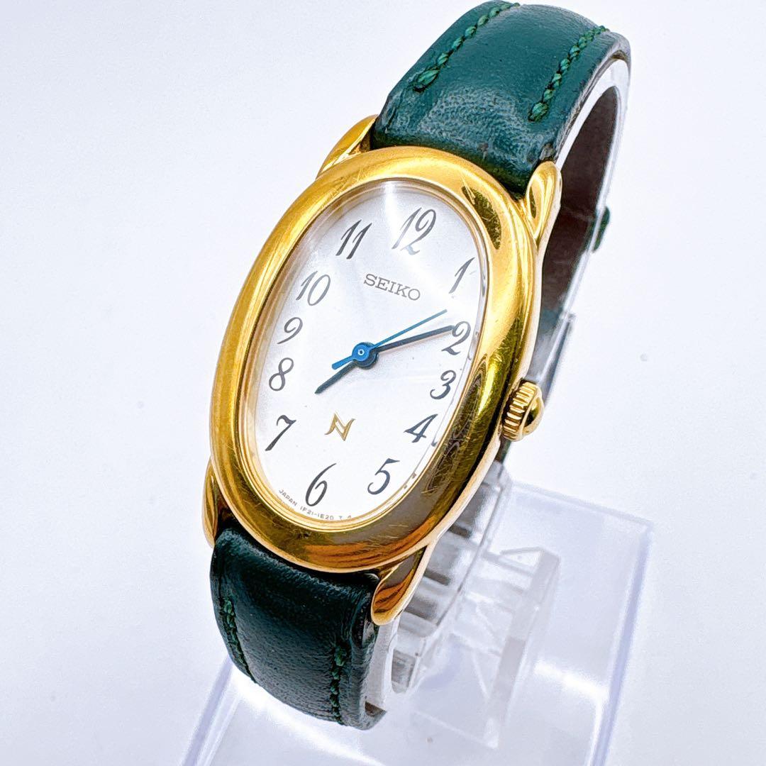 稼働品 SEIKO ゴールド グリーン 腕時計 N 電池交換済 レディース