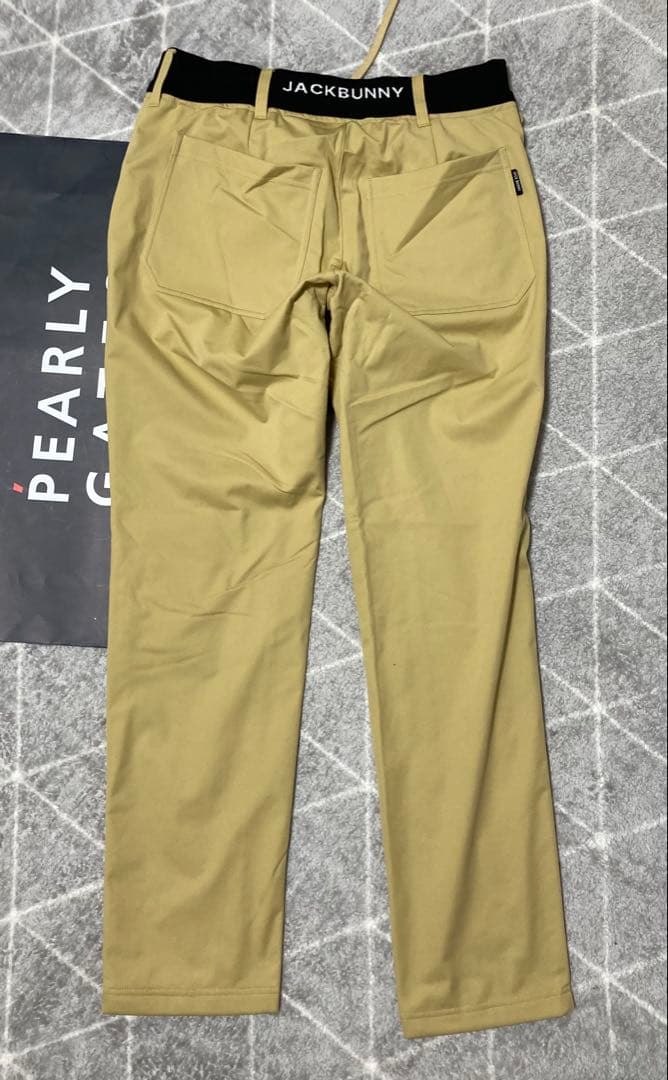 新品 パーリーゲイツ ジャックバニー エアシャット裏フリース防風パンツ 6 LL