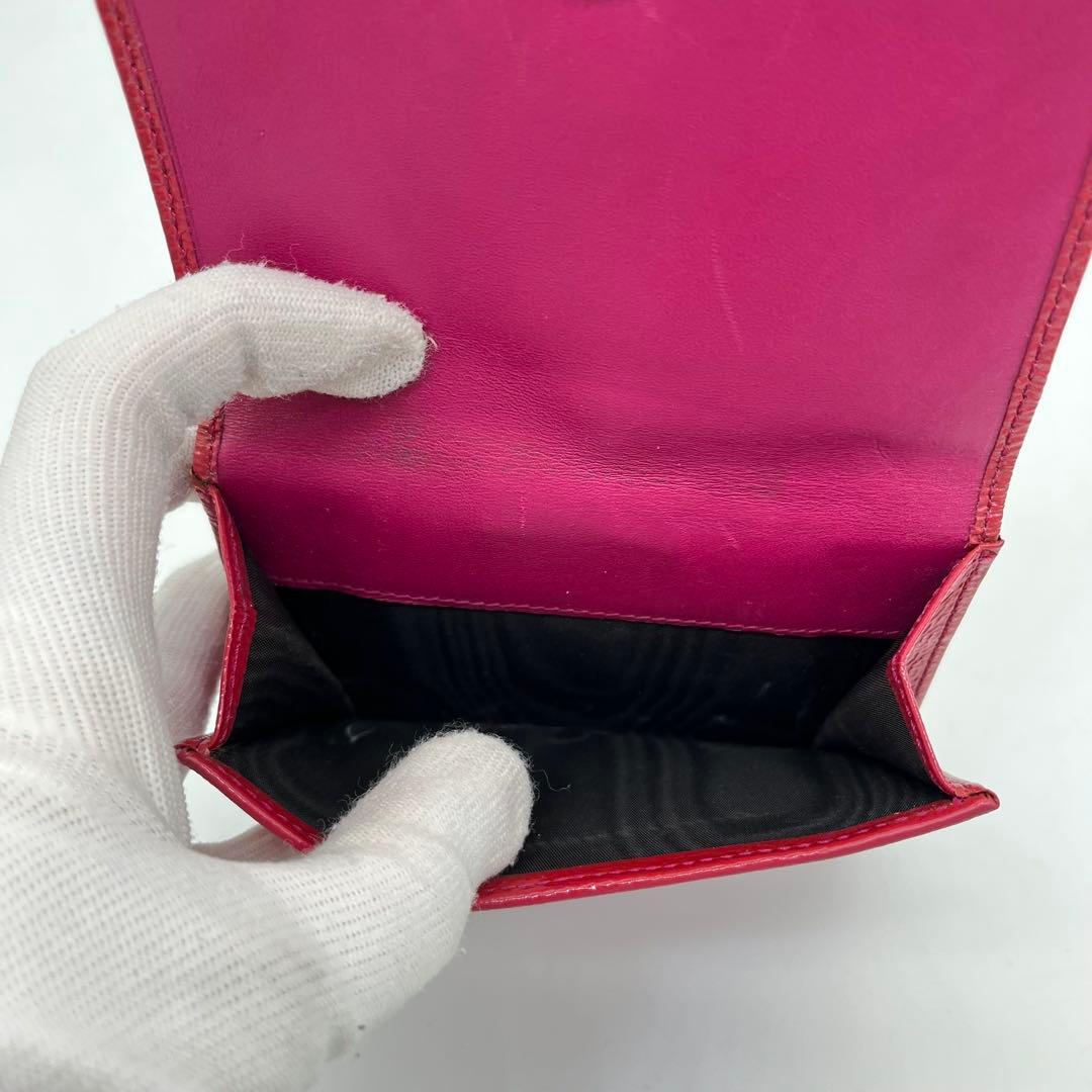 イヴサンローラン 二つ折り財布 カサンドラ YSLロゴ パテントレザー ピンク