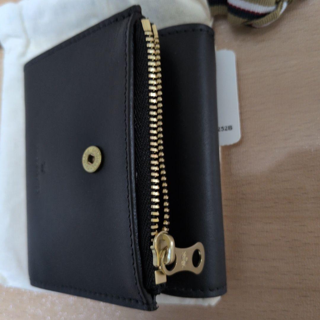 の*け様 イルビゾンテ二つ折り財布