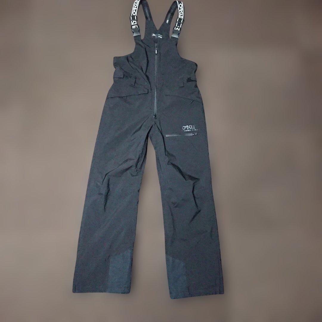 送料無料【OAKLEY】ブラック無地ビブパンツ L スノボやスキーに