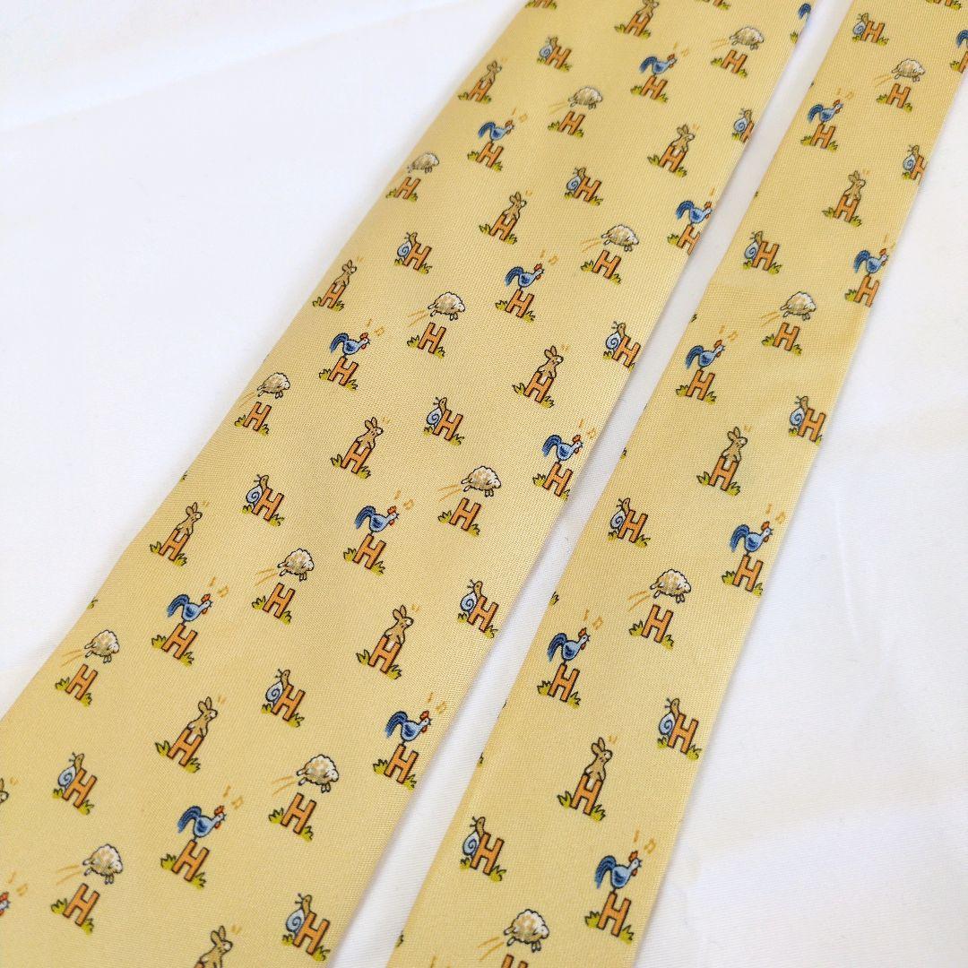 【美品】エルメス ネクタイ イエロー・オレンジ H柄 動物柄【フランス製】