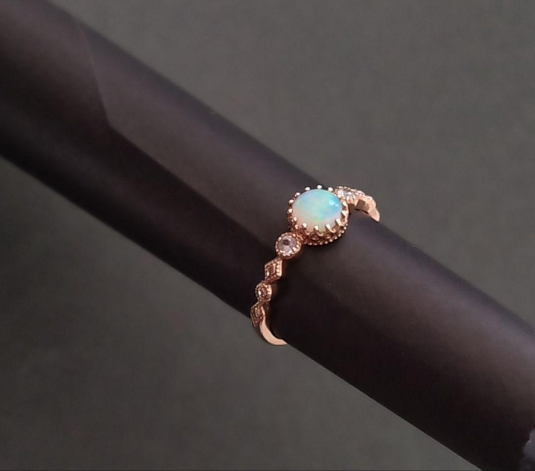 ツツミ　K10イエローゴールドオパールリング