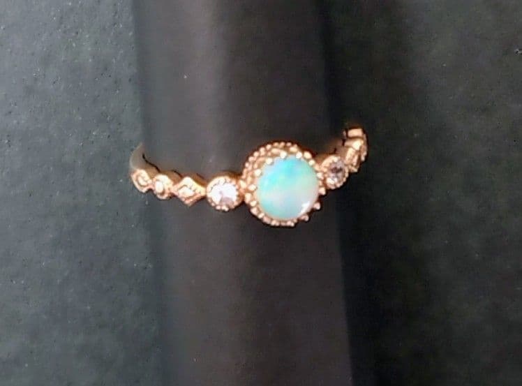 ツツミ　K10イエローゴールドオパールリング