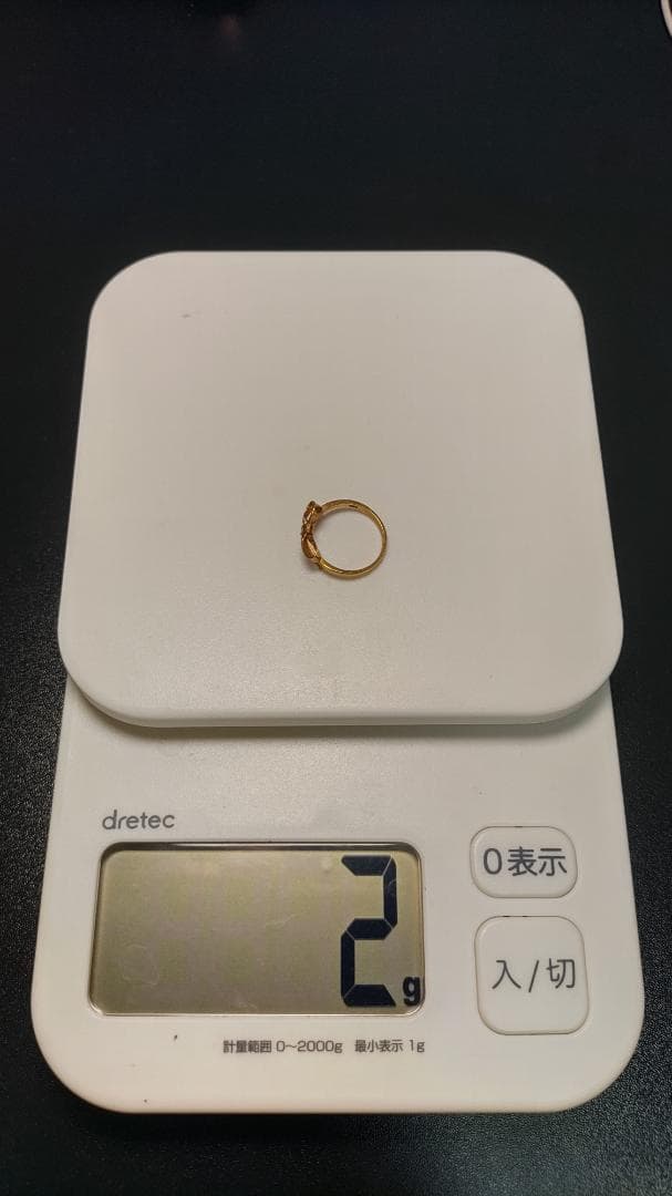 リボン型金色リング