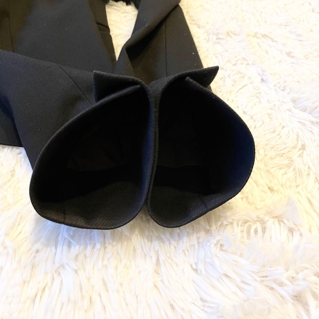 グリーンレーベルリラクシング カチリラ スーツ ノーカラーセットアップ ブラック