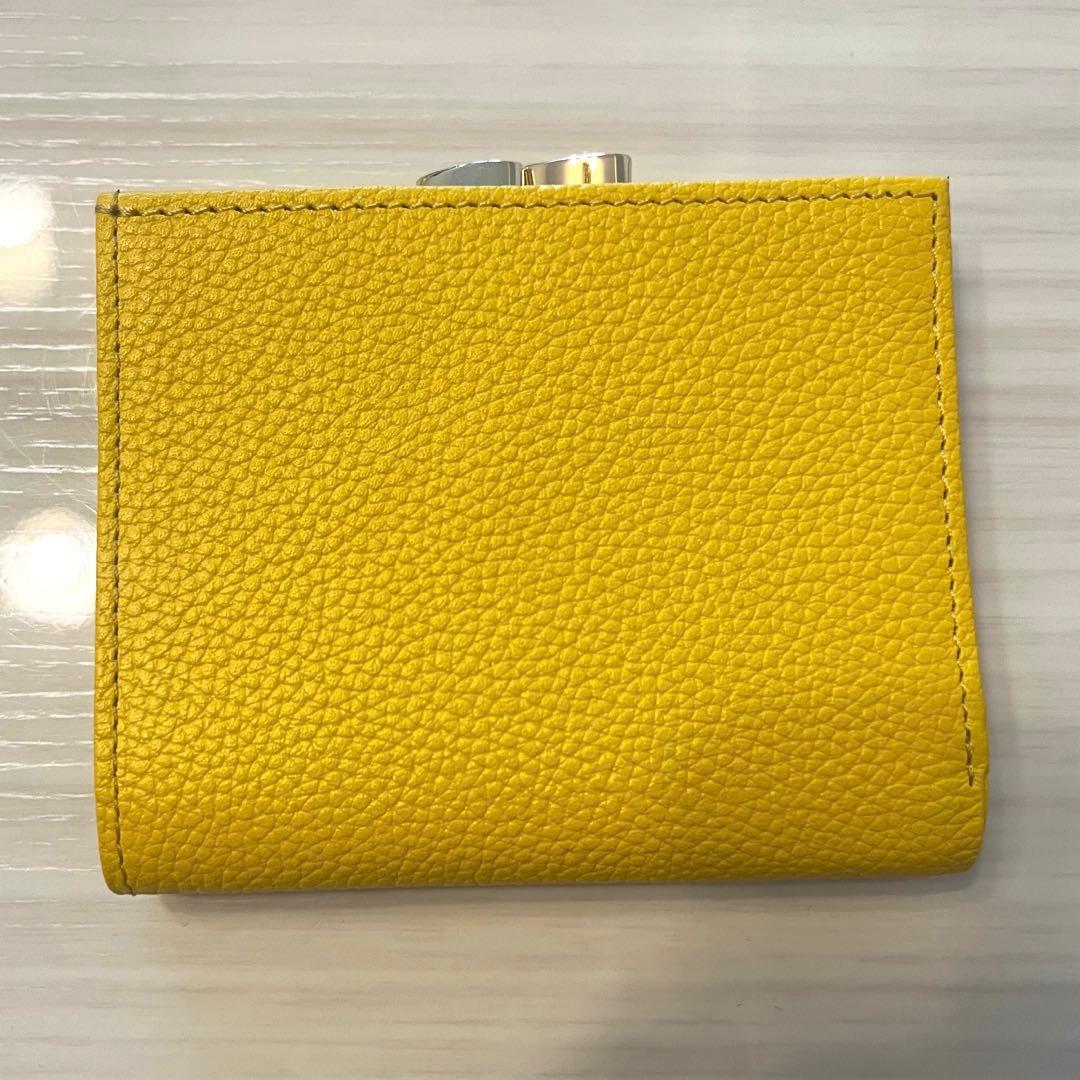 【新品・未使用】皇居 二つ折り財布 黄色 イエロー　がま口