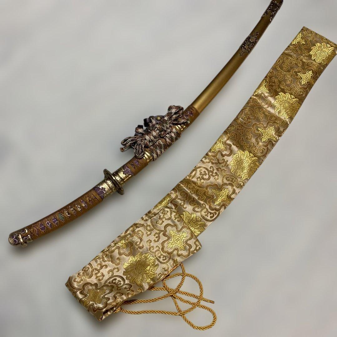 豪華版模造刀(刀袋付) 太刀造り 金茶柄 太刀型金鍔 金呂鞘