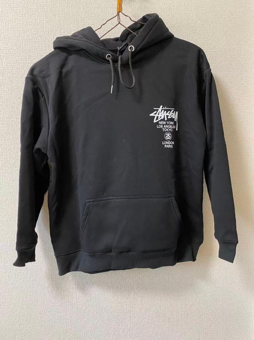 新品STÜSSY ワールドツアー プリント パーカー ブラック ステューシp