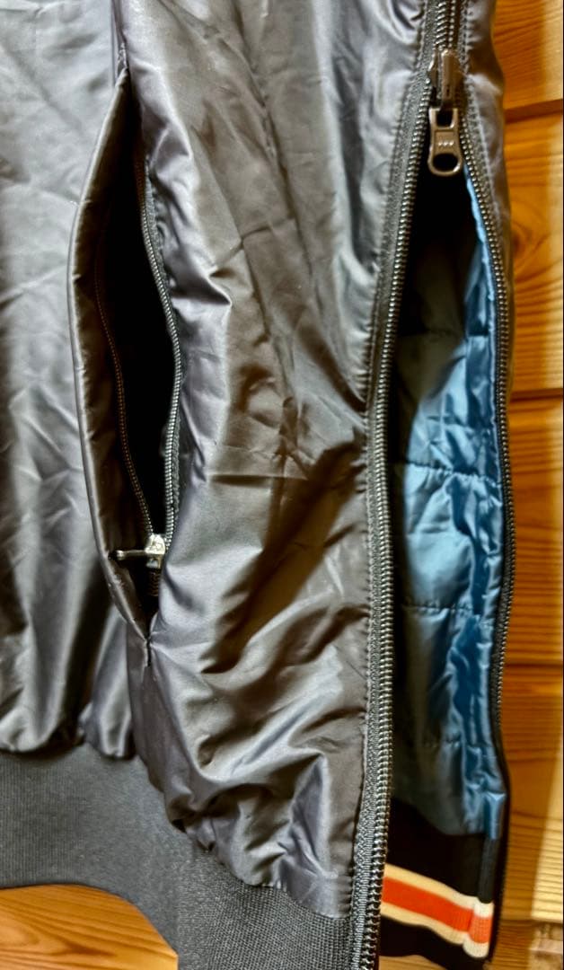 パーリーゲイツ　4way中綿スニード　黒×グリーン　サイズ4 (M)