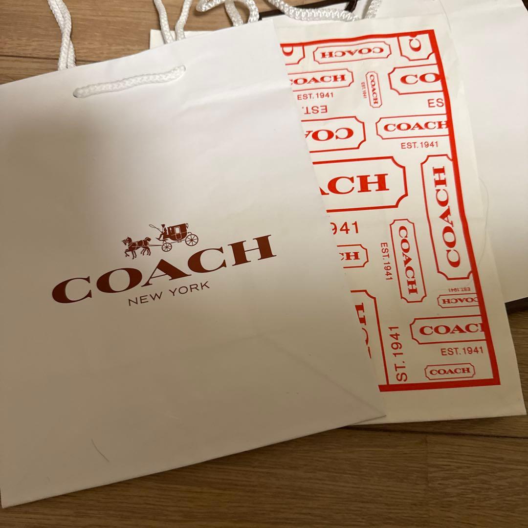 コーチ二つ折り財布