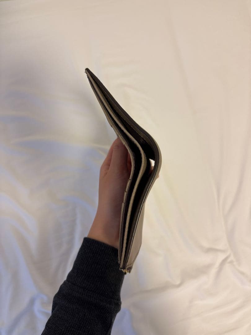 トリーバーチ　tory burch ベージュ　二つ折り財布