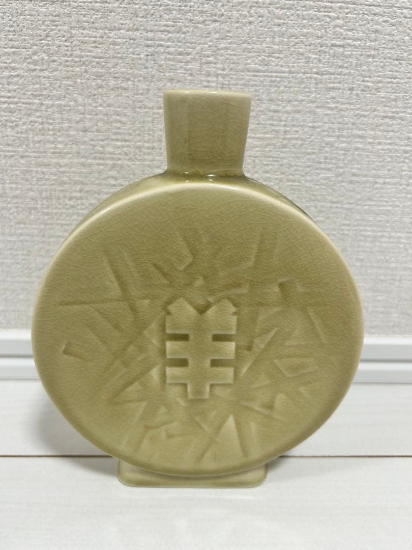 円形陶器花瓶 動物模様 幾何学模様