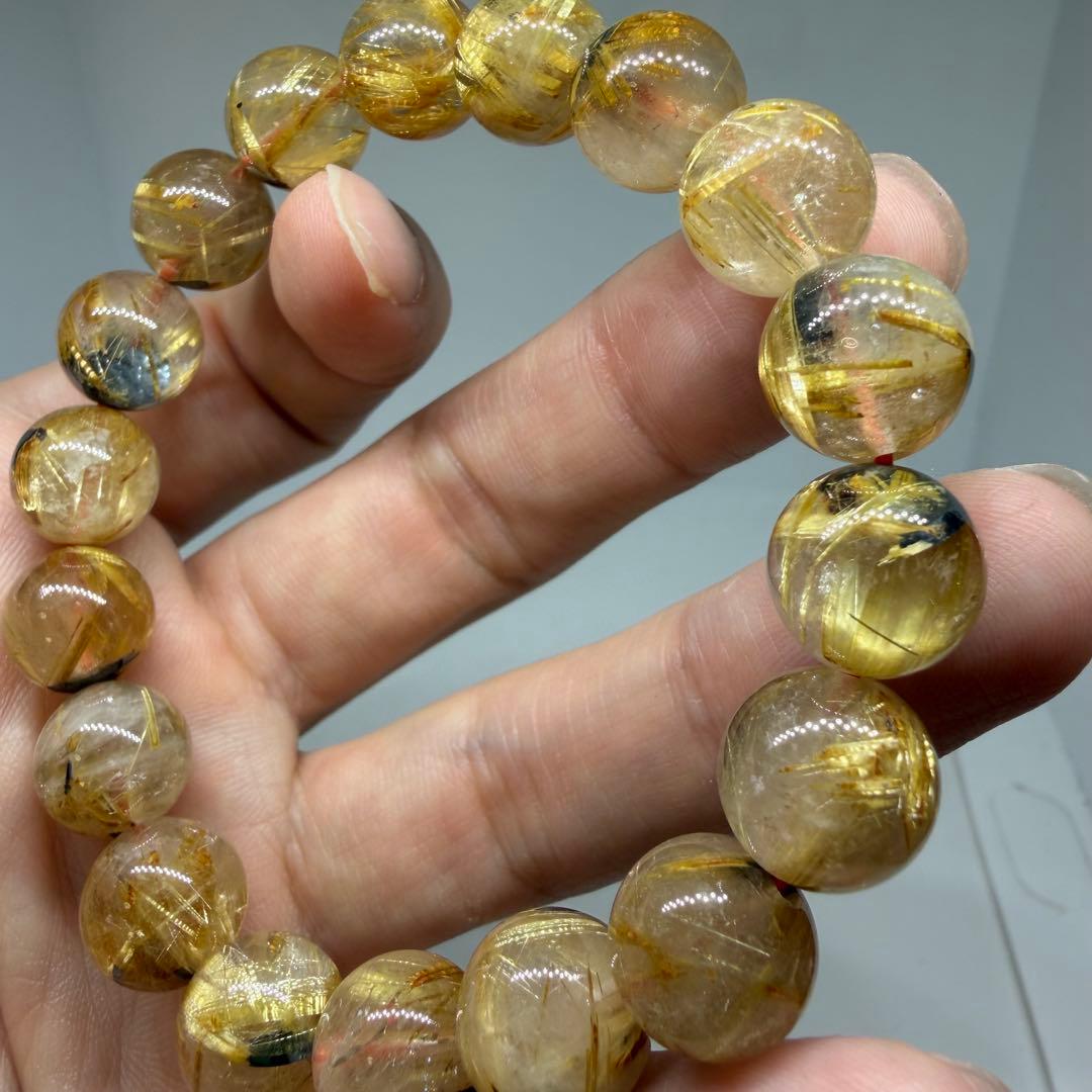 □125ブレスレット太陽放射ゴールドタイチン ルチルクォーツ 金運 z1965□