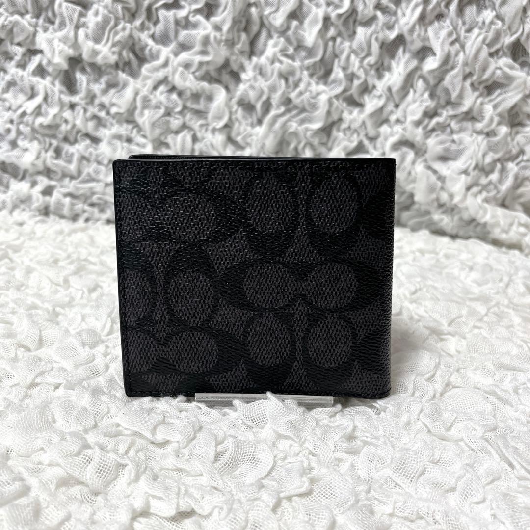 新品未使用✨COACH 二つ折り財布 ブラック モノグラム　コーチ　小銭入れ付き