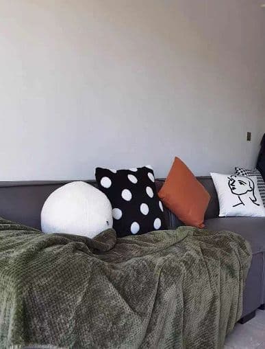 グリーンのかろやか軽やかなタケットソファのもーふ毛布