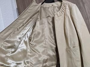 142 新品未使用保管品　タグ付き　ラムレザー　ブルゾン　コート　ノーカラー