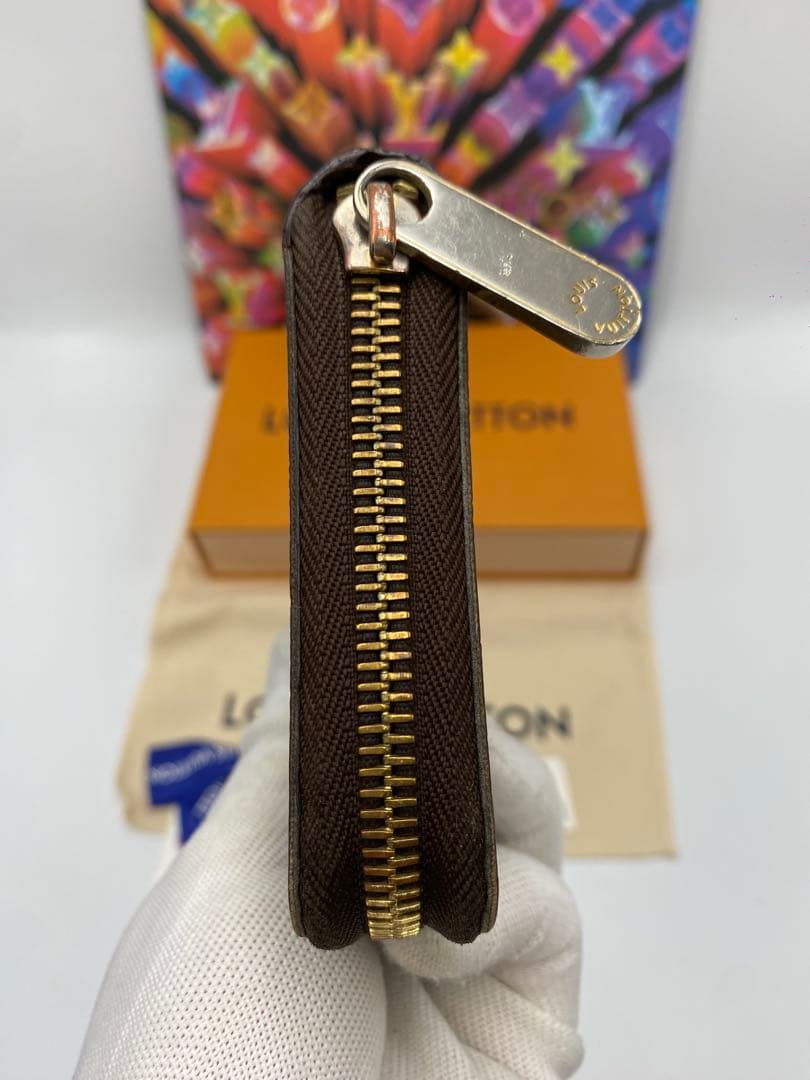 ルイヴィトン モノグラム ジッピーウォレット 長財布 ブラウンMI2173