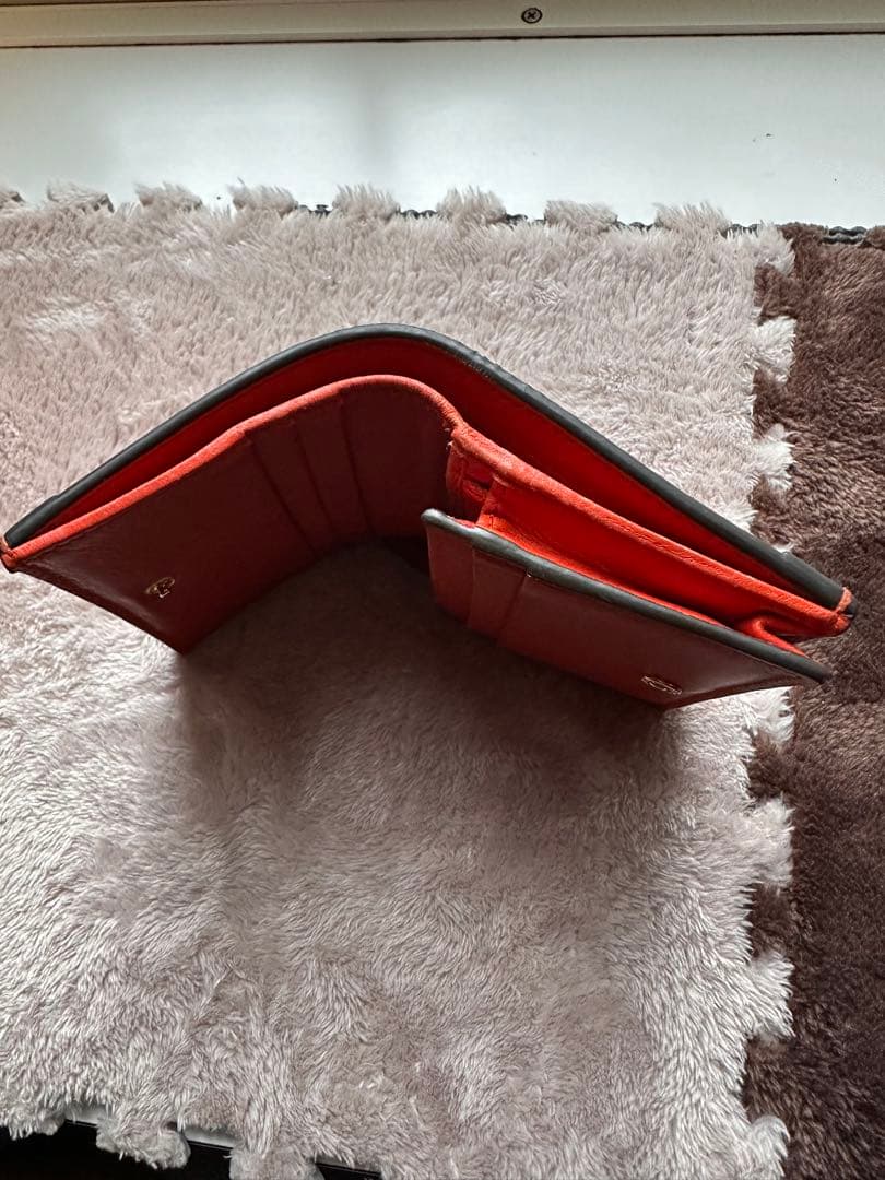 GUCCI ヘビ革 二つ折り財布 オレンジ　パイソン