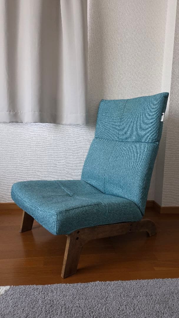 青いファブリックリクライニングソファ