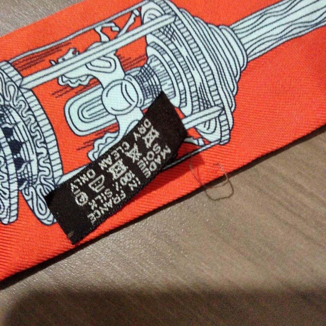 ま HERMES ツイリー オレンジ シルク スカーフ