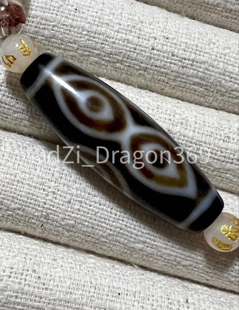 dZi ジービズ 西蔵 仏六眼天珠と『赤富士』レッドファントム水晶