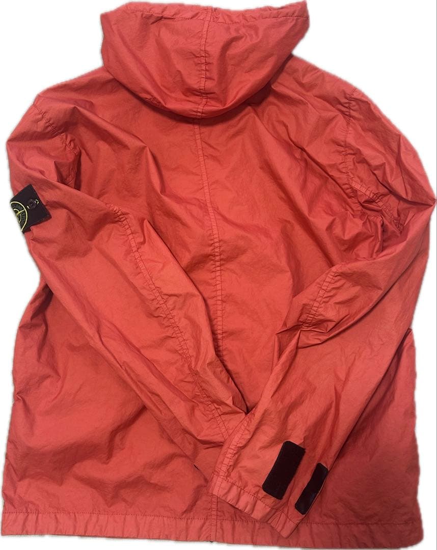 オレンジ フード付きジャケット