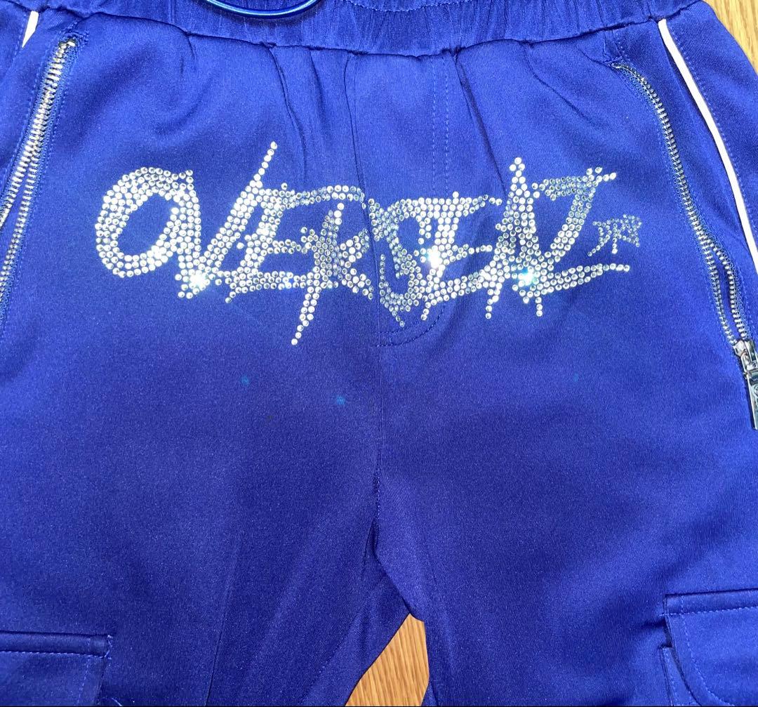 ブルー カーゴパンツ ストーンロゴ