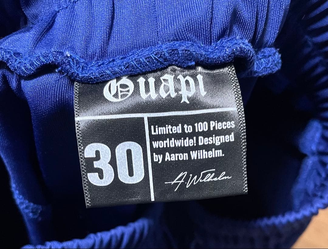 ブルー カーゴパンツ ストーンロゴ