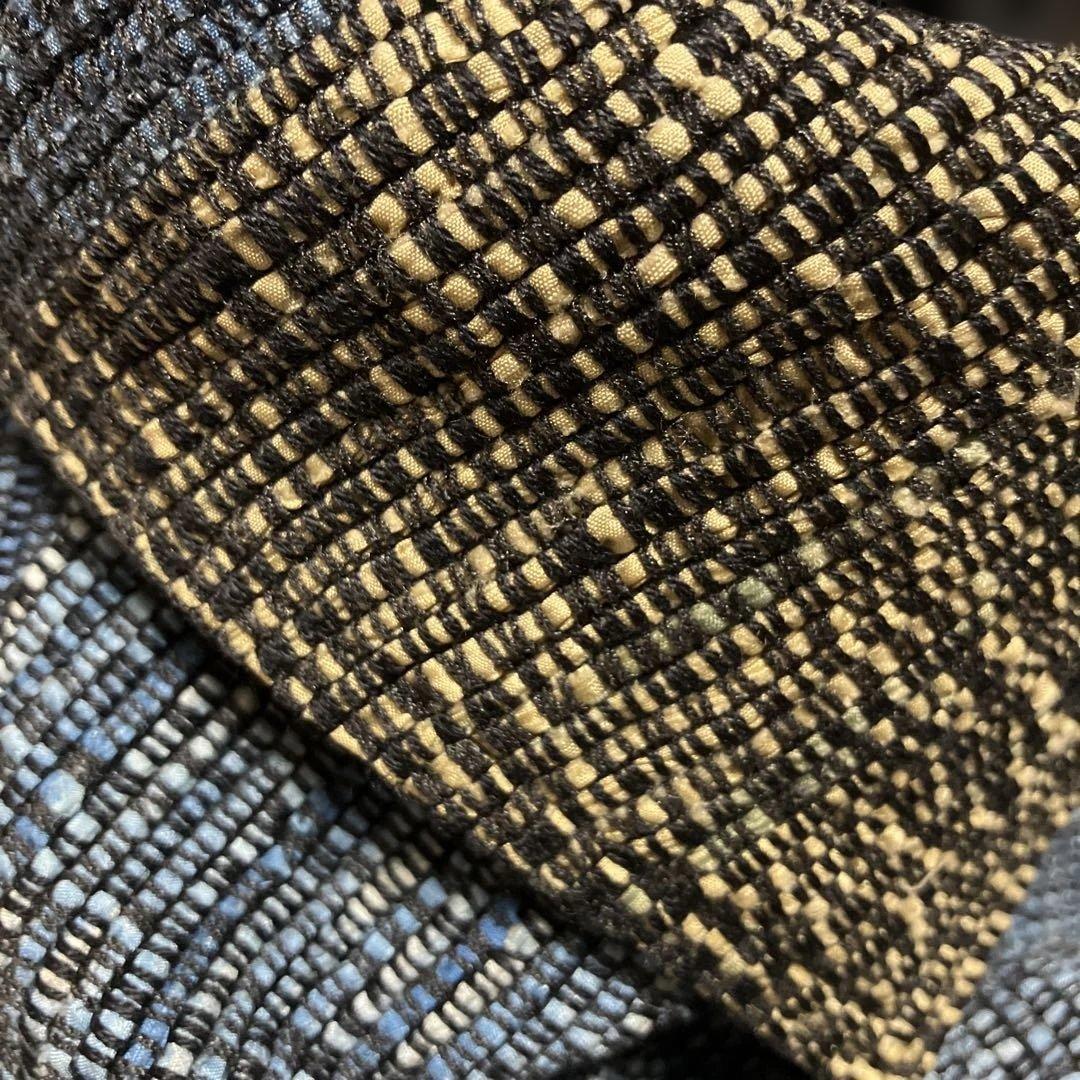 裂織の豪華なコート