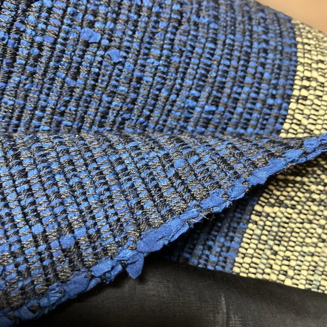 裂織の豪華なコート