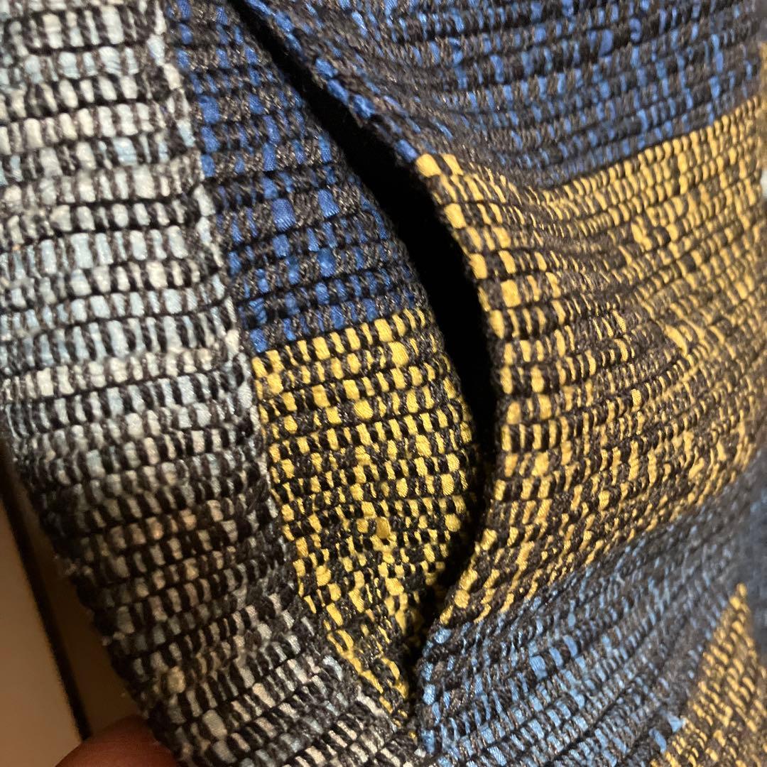 裂織の豪華なコート