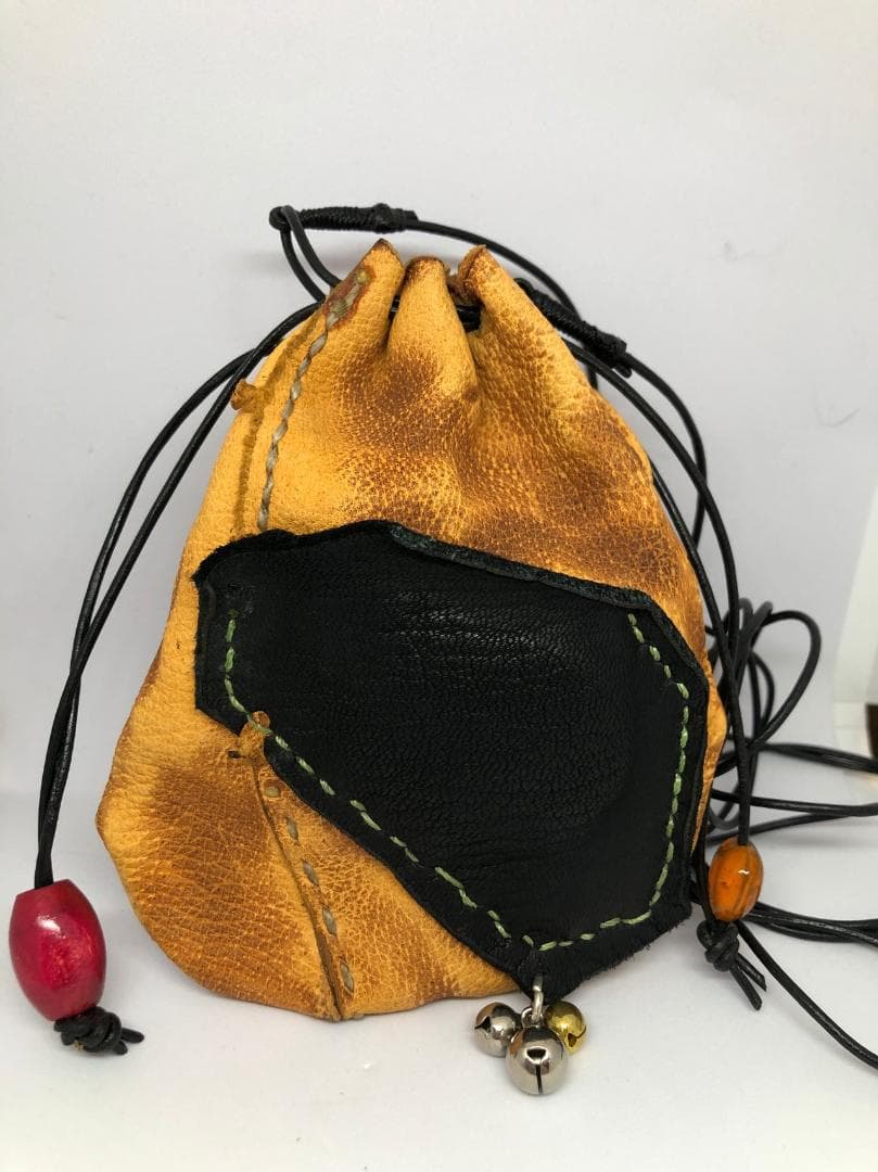 A60.レザー巾着バッグ オレンジと黒