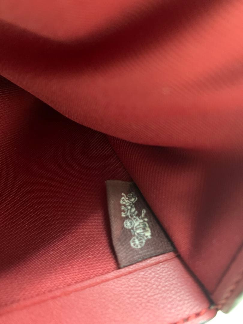 コーチ　二つ折り財布 トゥルーレッド.