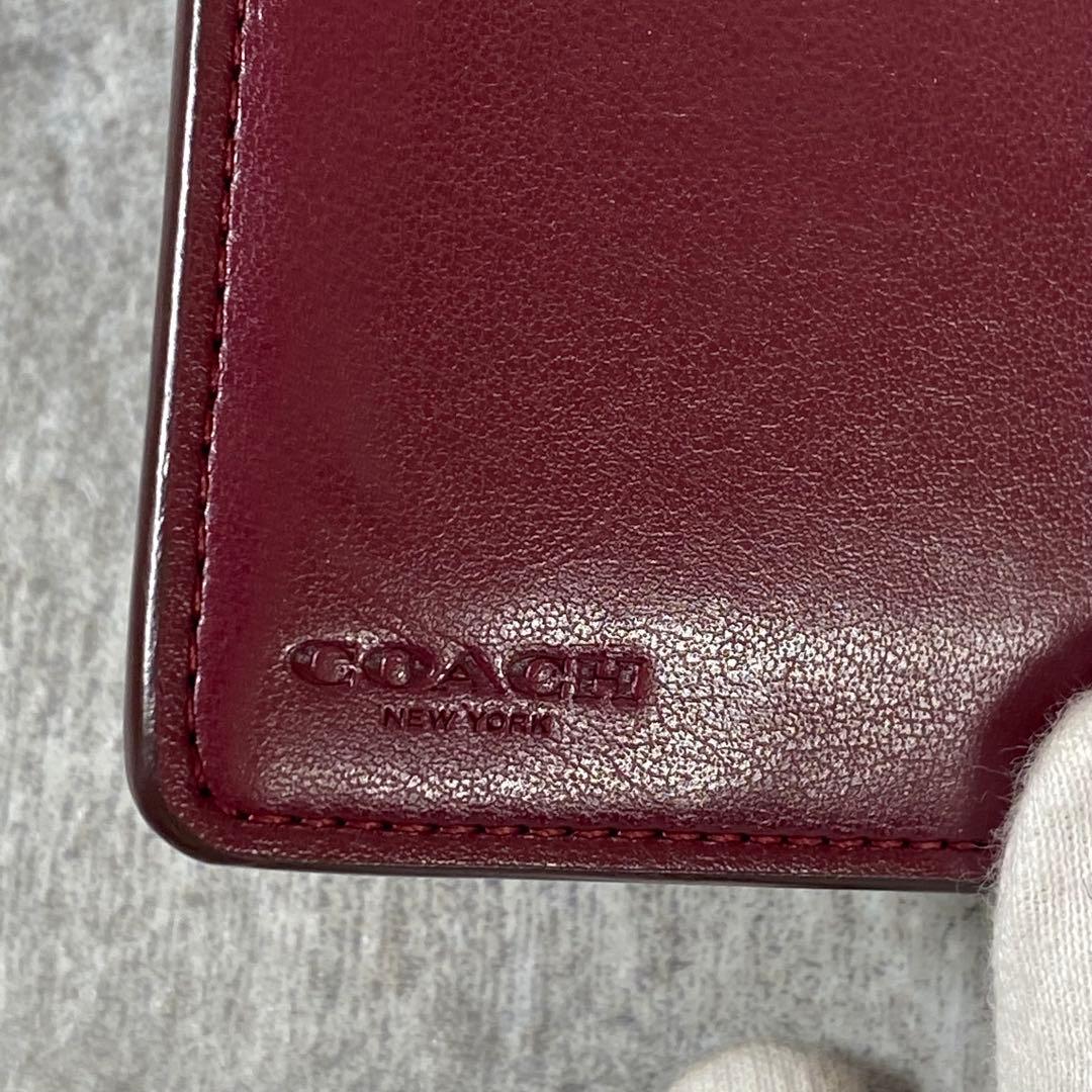 未使用　COACH　2つ折り財布　PVCレザー　シグネチャー　アップル りんご