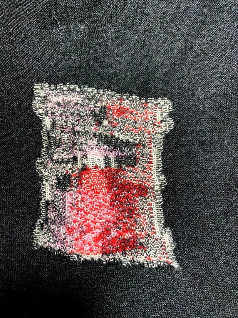 CHANEL カシミアノースリーブセーター　Parisモチーフ