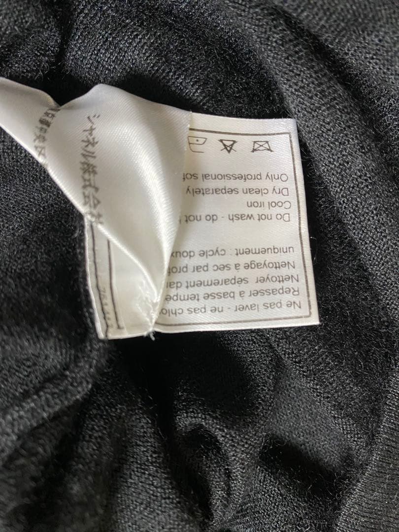 CHANEL カシミアノースリーブセーター　Parisモチーフ