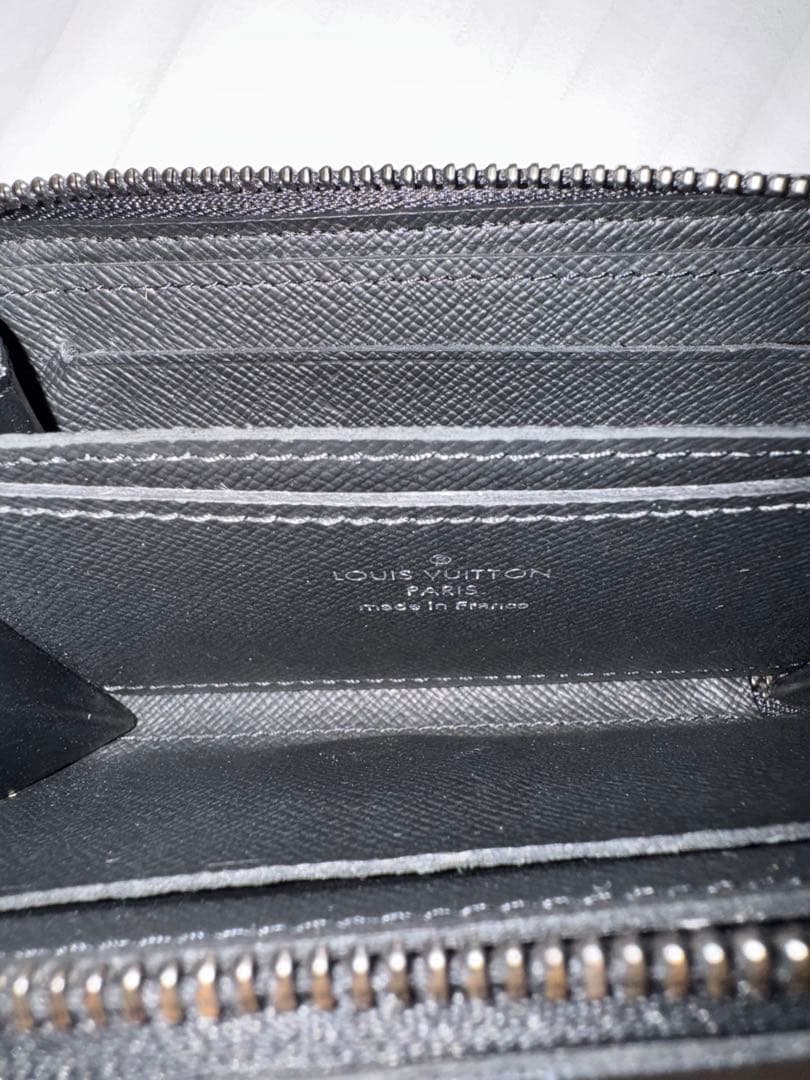 ルイヴィトン ジッピー・パースヴェルティカルM81662