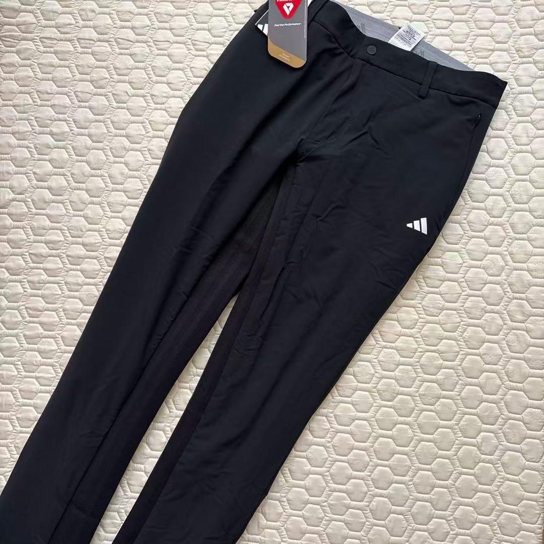 92cm新品27500円アディダスゴルフ/メンズ/秋冬/中綿ストレッチパンツ/黒